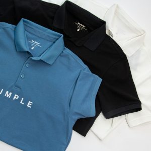 three polo shirts with the word simple printed on them